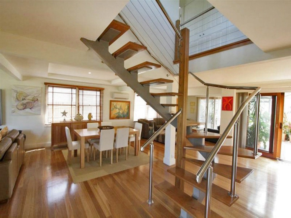 Open plan downstairs with staircase leading to bedrooms. Illalangi